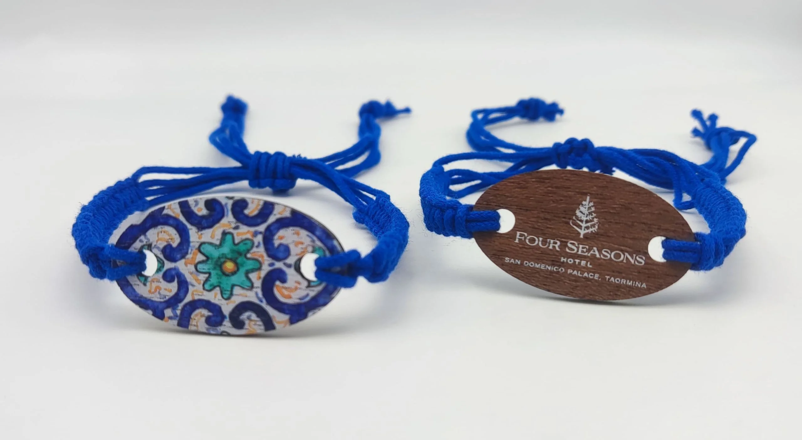 Mediterranean ceramic-inspired RFID wristband with Sicilian patterns and Four Seasons branding