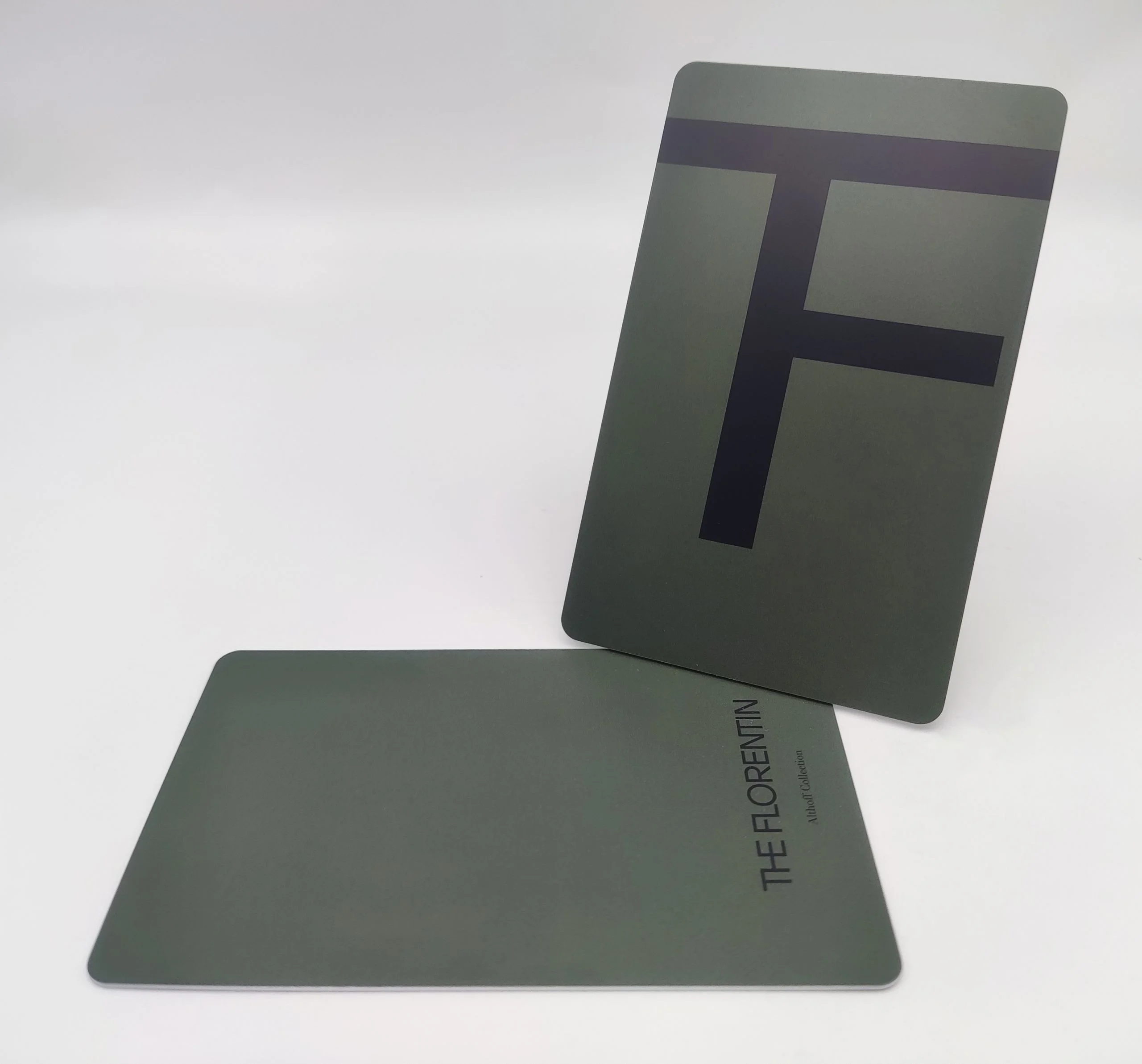 Two gray plastic hotel key cards featuring the text "The Florentin" in a modern, minimalist design.