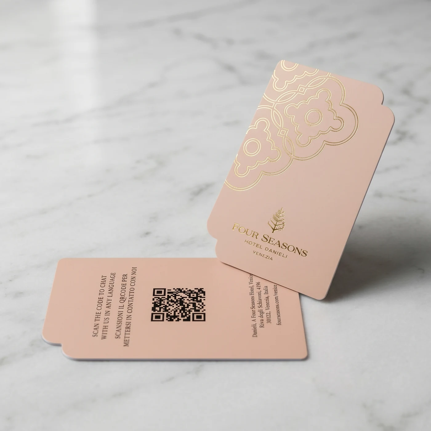 Four Seasons Hotel Danieli Venice blush pink RFID key card with raised gold foil Venetian quatrefoil pattern